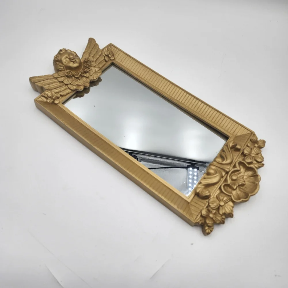 Vintage gold 80s Hollywood Regency Cherub Angel Figural Wall Mirror guilded